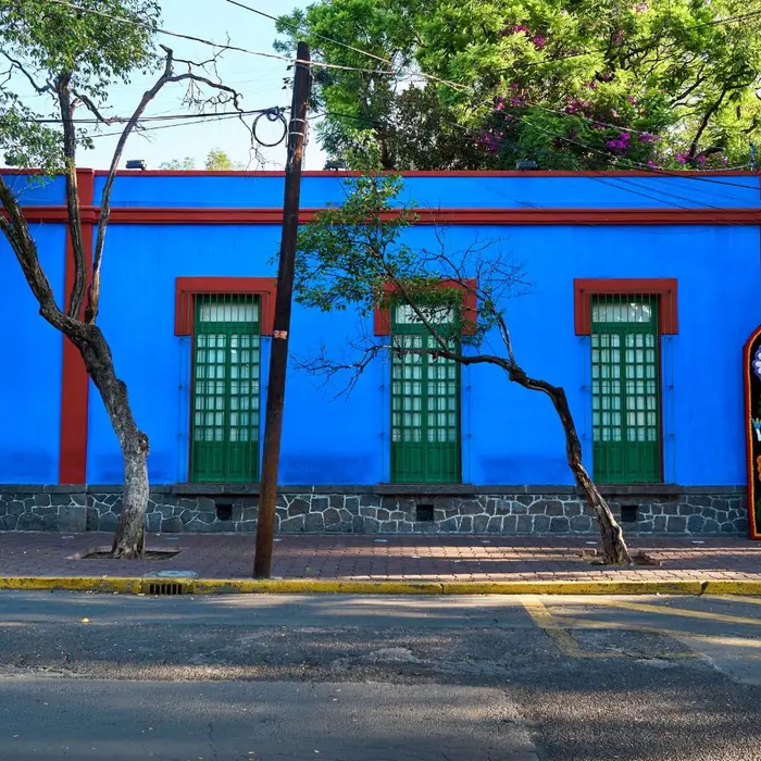 The Original “Cluttercore”? Frida Kahlo Did It First (and Better)