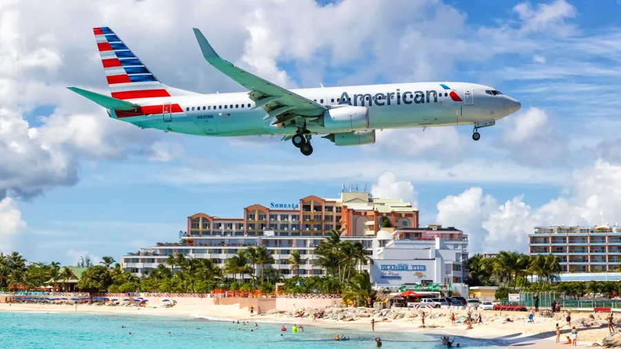 American Airlines Boeing 737-800 airplane at Sint Maarten airport (SXM) in the Caribbean. Boeing is an American aircraft manufacturer headquartered in Chicago.