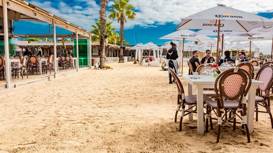 Cape Town, South Africa - May 12, 2022: Grand Africa Cafe and Beachfront bar and restaurant