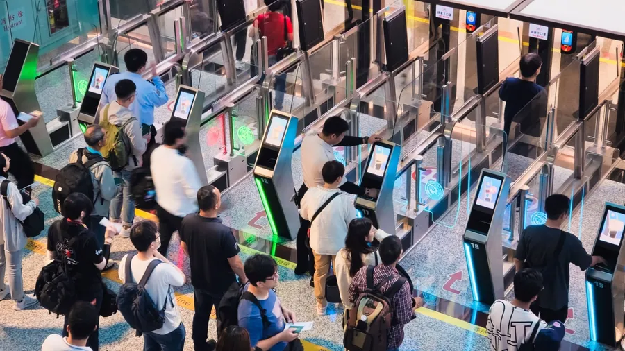 Taipei, Taiwan - May 25, 2024 : People pass through automated passport check Immigration control Taoyuan International Airport