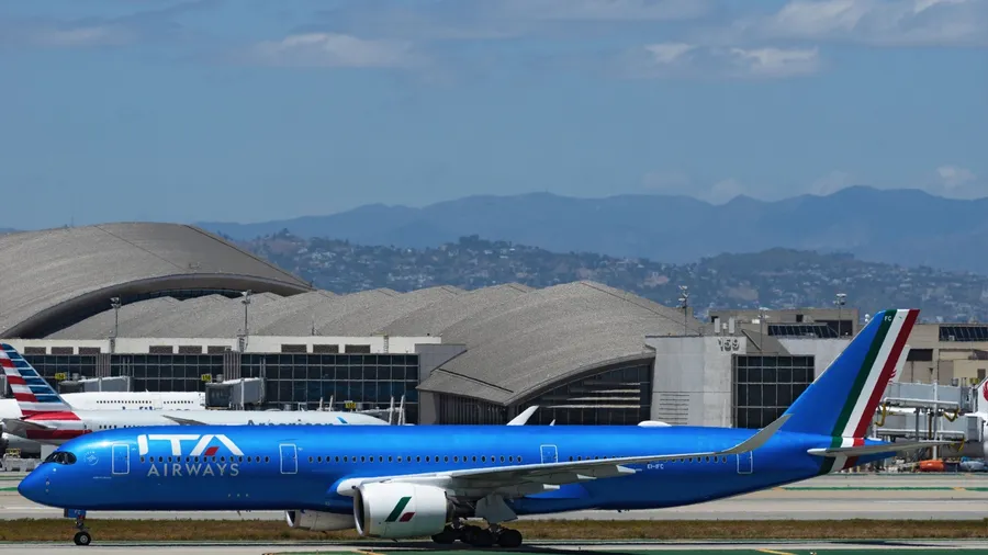 Los Angeles, California, United States - May 5, 2024: ITA Airways Airbus A350, EI-IFC, shown taxiing at LAX, Los Angeles International Airport.