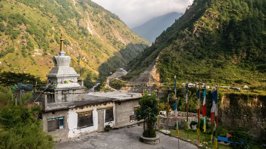 Tibetan Buddhist pagoda in Syabrubesi village a beautiful resident village inside the Langtang National Park of Nepal.