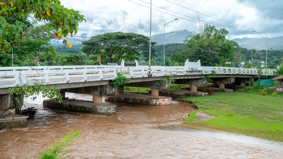 Chiang Mai, Thailand, October, 02, 2024 : Mittraphap Maenam Khong Bridge is bridge over the Khong River at Muang Kong.