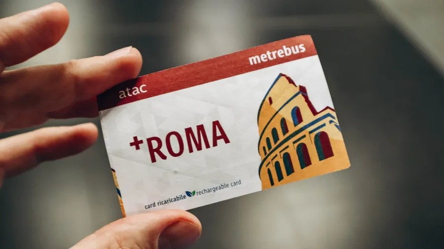 Rome, Italy - 27.12.2023: Card for travel on the metro in Rome in a man's hand
