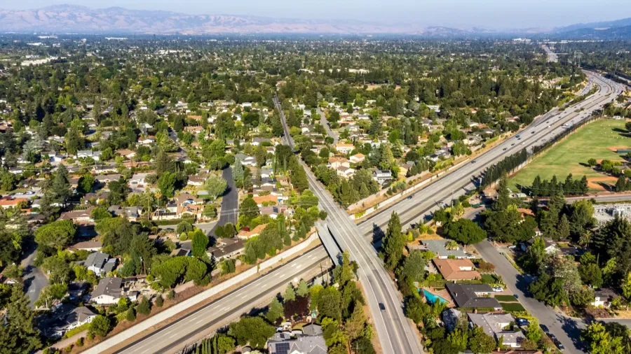 aerial view of highway 85 cutting through a residential neighborhood