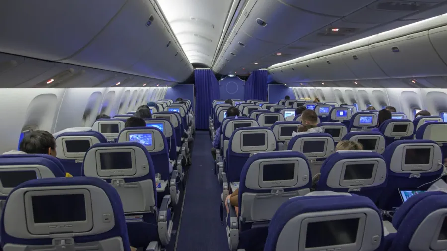 airplane interior with passengers