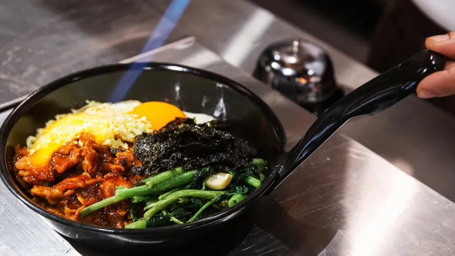 bibimbap korean rice mixed with kimchi pork seaweed and stir