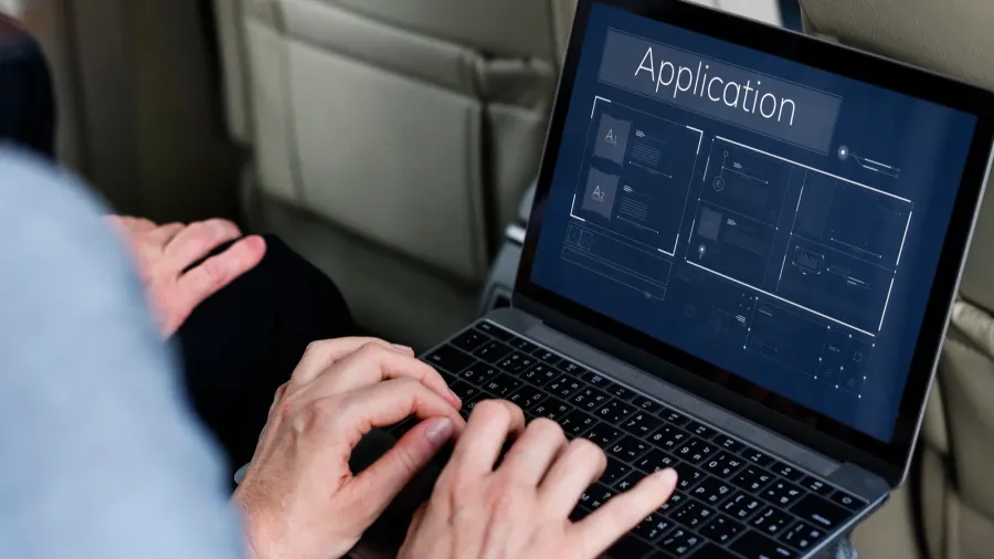 businessperson using laptop