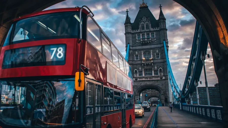 classic red double decker at the tower bridge in london