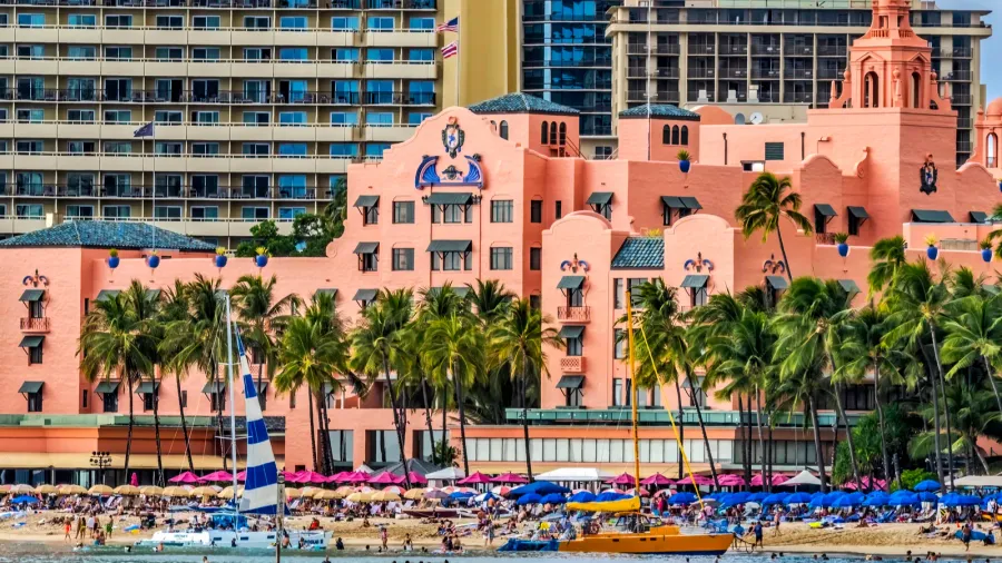 colorful old hotel buildings swimmers waikiki beach hotels honolulu hawaii