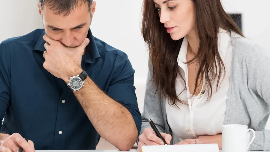 couple calculating budget