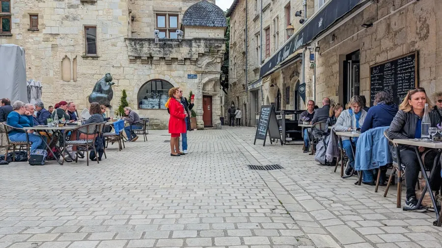 france may 3 2024 historic city cafe scene with pedestrians
