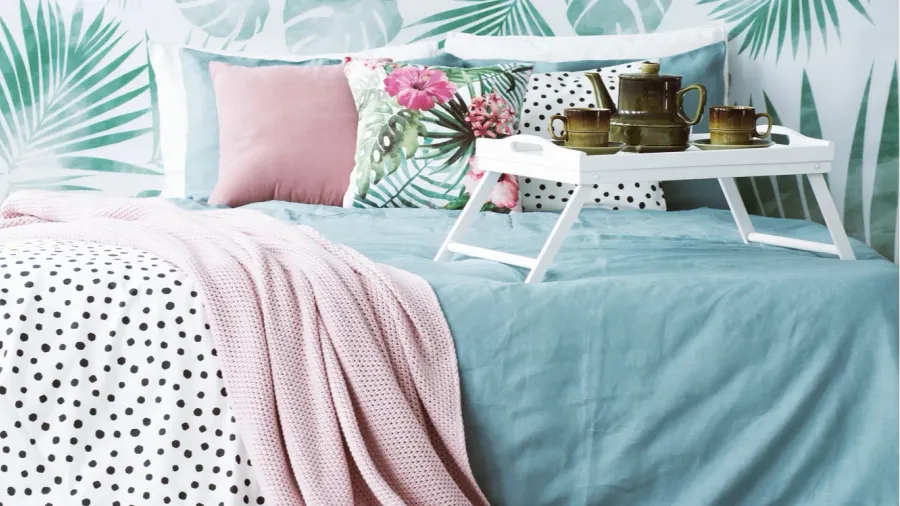 leaves in cozy bedroom interior