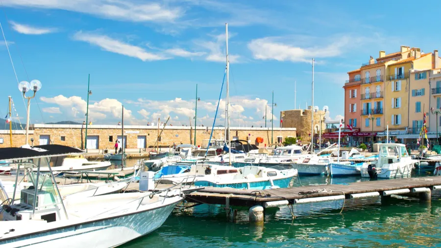 mediterranean landscape with boats and old buildings