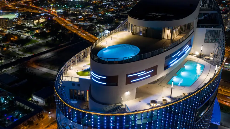 night aerial photo paramount miami worldcenter rooftop pool deck