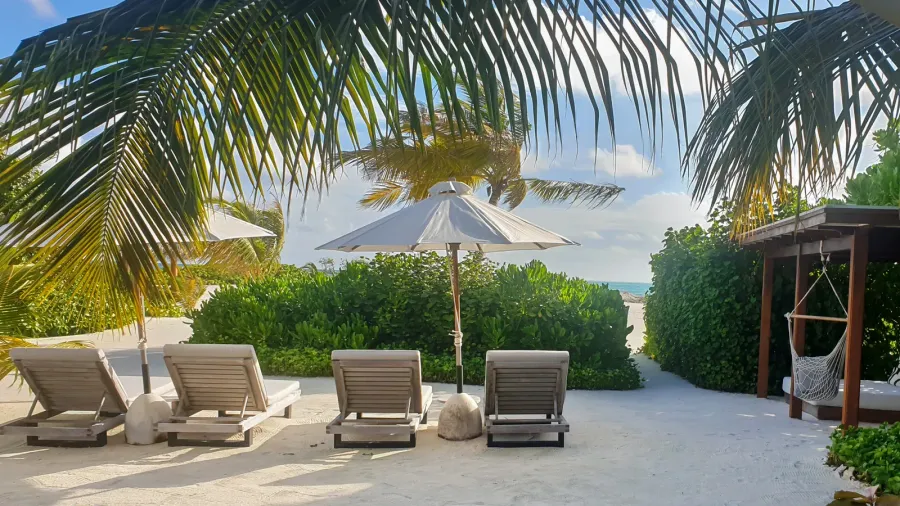 overwater bungalows and luxury villas in the blue lagoon on
