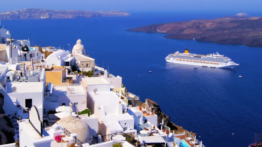 panoramic view of the town of fira santorini greece