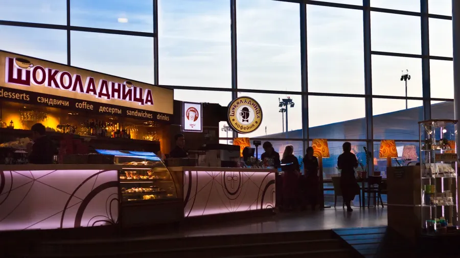 people in restaurant at airport