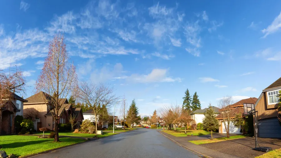 residential suburban neighborhood in the city during a vibrant winter