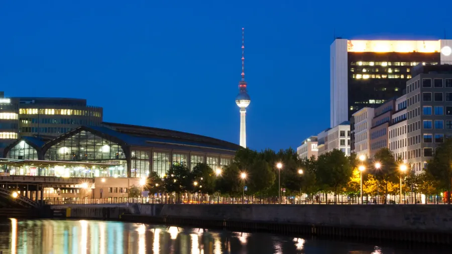 the berlin friedrichstrasse railway station at sunset in summer