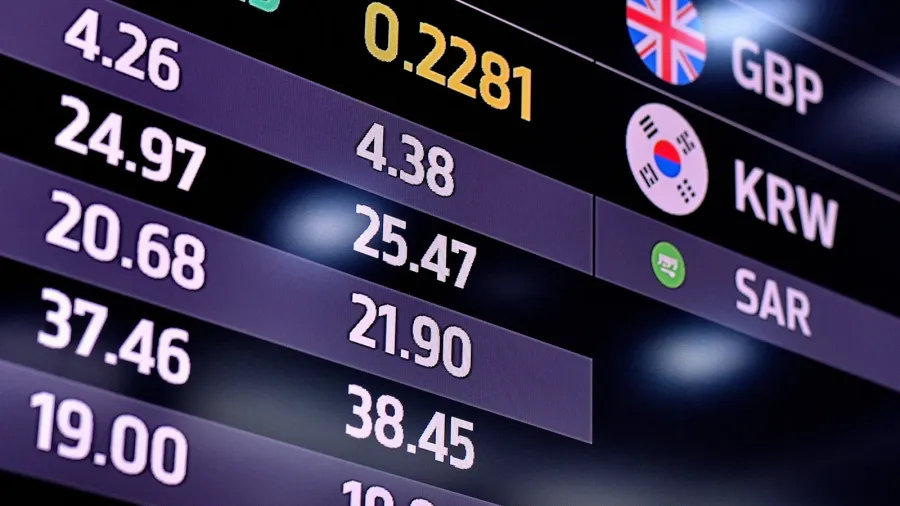 this image shows an electronic display board featuring foreign exchange