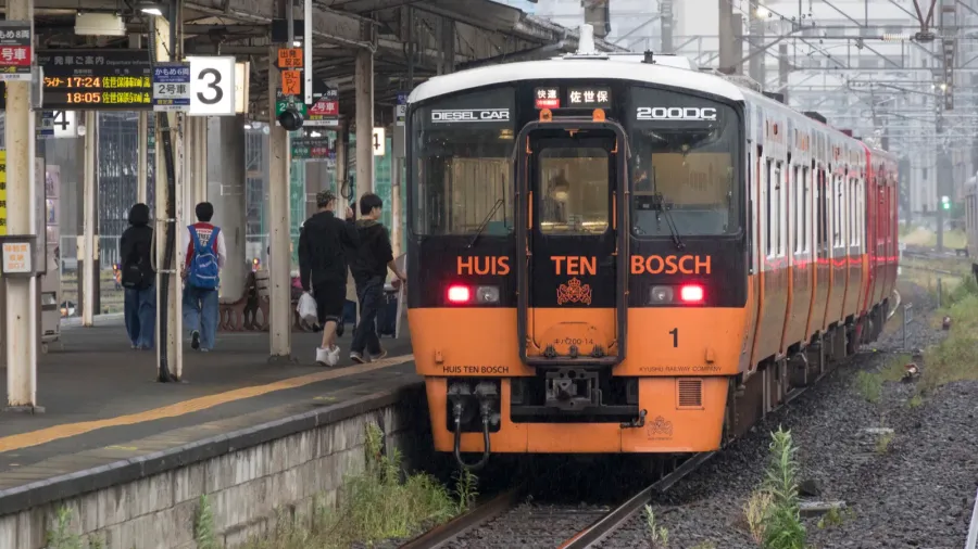 trains on crowded railway station at daytime japan