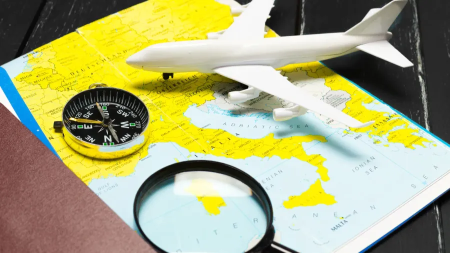 travel objects on wooden background