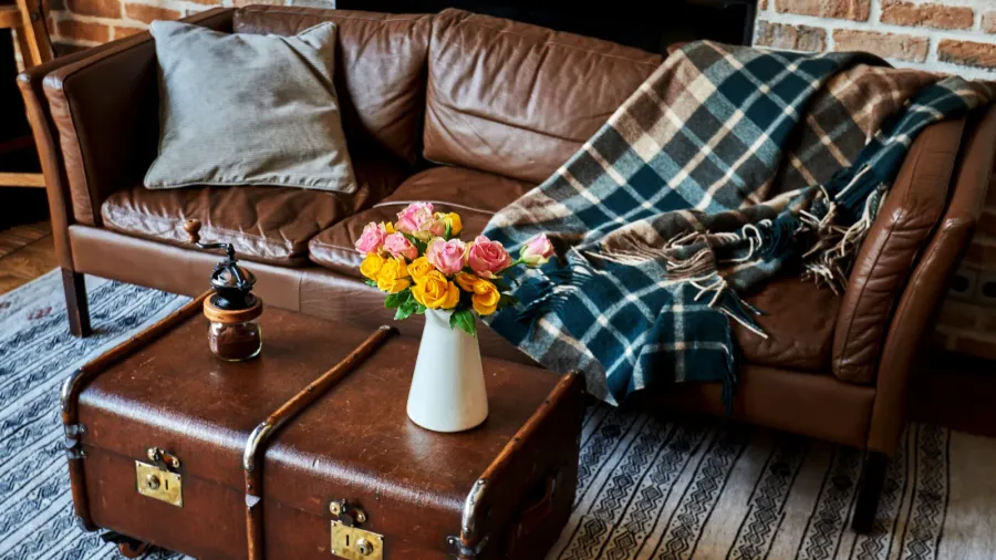 vase of flowers and a vintage coffee table